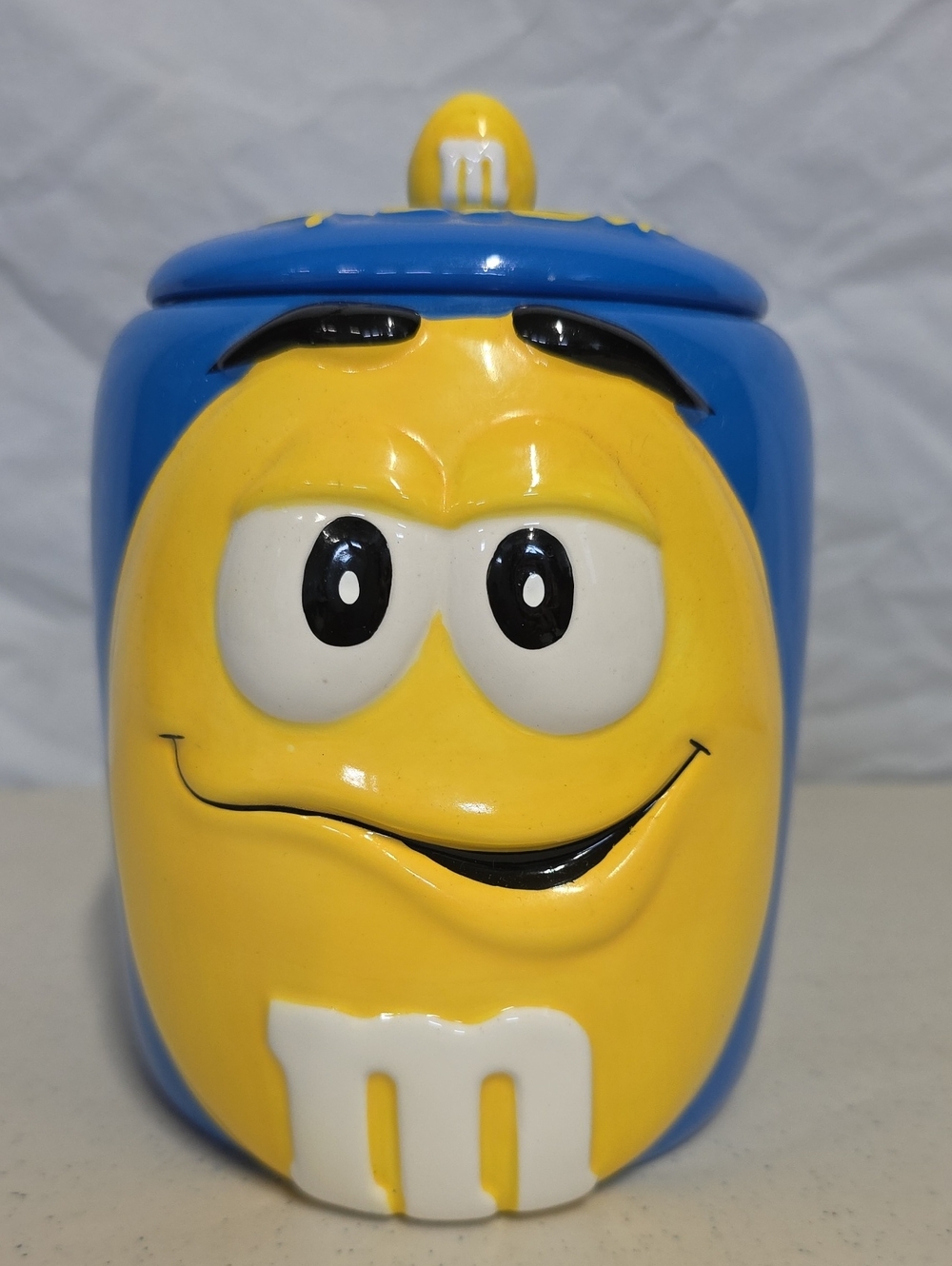 M&M Ceramic Cookie Jar Blue And Yellow Approx7" Tall